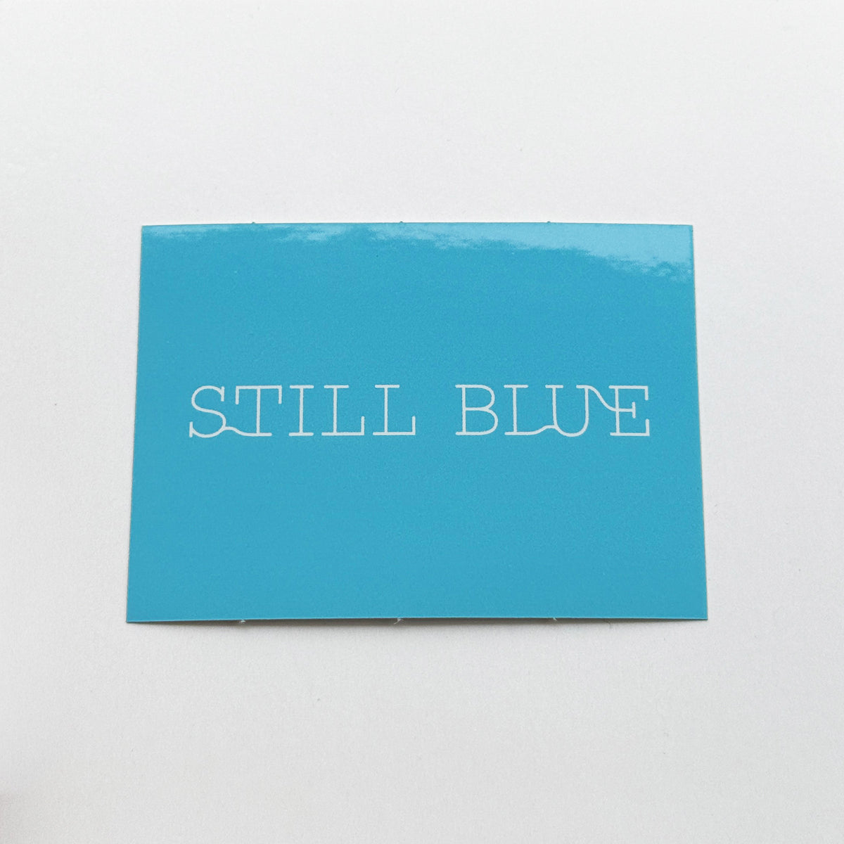 STILL BLUE sticker